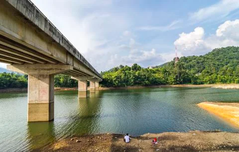 Fishing under the bridge Stock Photos