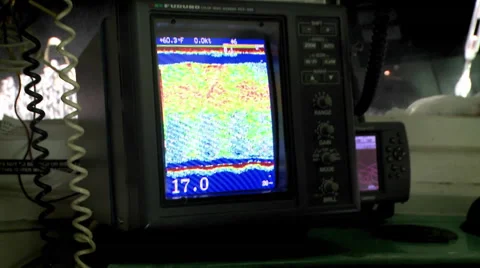 A fishing vessel uses a sonar device to find fish. Видео 46576208