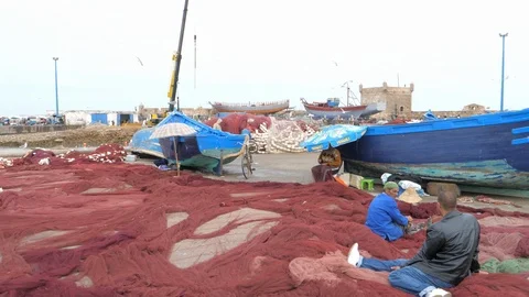 Fishing vessels berthed at the Marrakech port, fish nets, Morocco, Africa in 4K Stock Footage 93854575