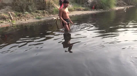 Fishing in Yamuna river Stock Footage 32865268