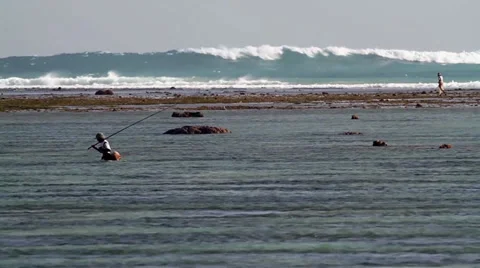 Fishman at the ocean Stock Footage 27448901