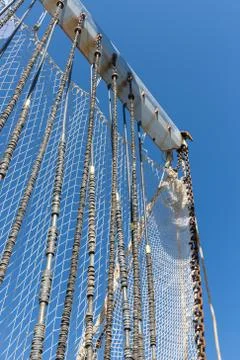 Fishnet drying in the wind Stock Photos