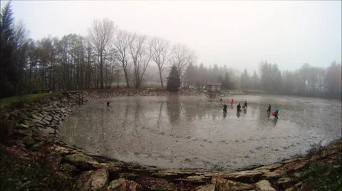 Fishnet in an empty pond Stock Footage 32351207