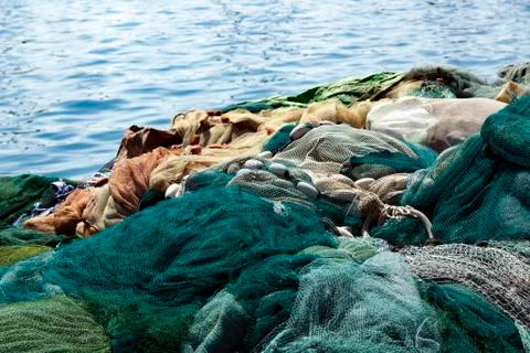 Fishnets by the water Stock Photos