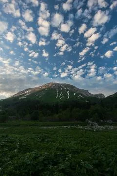 Fishtail Mountain Under a Cloudy Sky Stock Photos