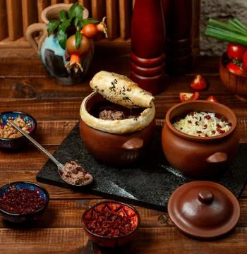 Fisinjan with rice on the table Stock Photos
