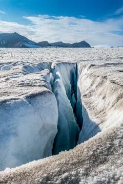 Fissure in top surface of a glacier Stock-Fotos