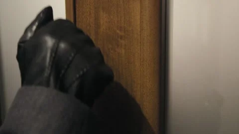 Fist in a black leather Stock Footage 133491948