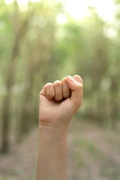 Fist with blur background body language sign fighting sign. Stock Photos