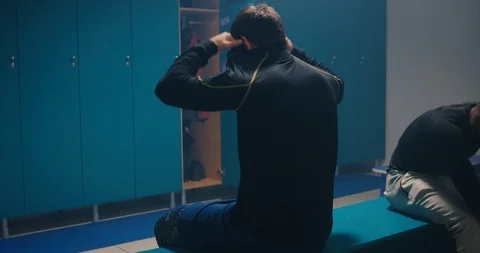 Fist fighting in locker room | Stock Video | Pond5