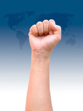 Fist hand on world map background Stock Photos