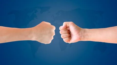 Fist hand on world map background Stock Photos