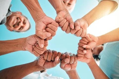 Fist, hands circle and below group of family, men and women for support Stock Photos