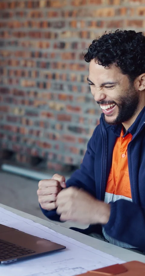 Fist pump, man and architect with laptop on site with approval for renovation, Stock Footage 337028599