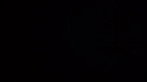 A fist rises to the top on a black background Stock Footage 150832666