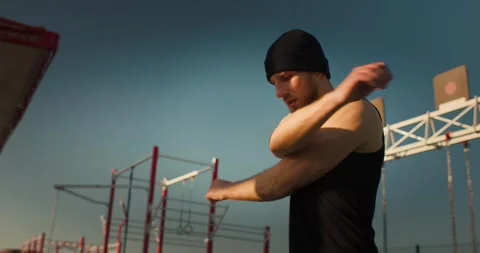 Fit active man warms up before training. Healthy lifesty, outside training Stock Footage 279321438