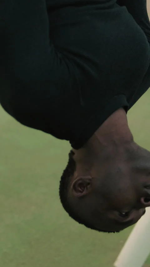 Fit guy does street workout, calisthenics exercises on gymnastics rings Stock Footage 284575724