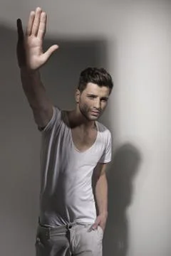 Fit guy in welcome position Stock Photos