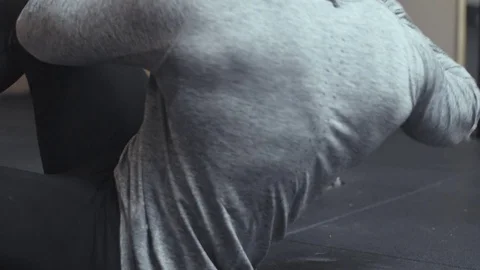 Fit Man doing slow sit up crunches in Gym Stock Footage 77049717