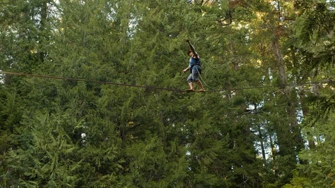 Fit Man Highlining Over A Waterfall Stock-Footage 102918035