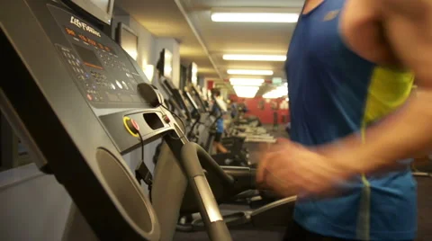 Fit man on treadmill Stock Footage 46546374