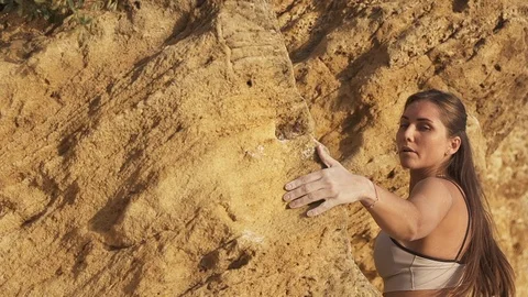 Fit woman climb on the rocks without rope Stock Footage 115322553