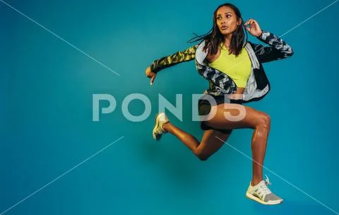 Fit woman training in studio Stock Photos