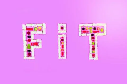 Fit word made of sweets Stock Photos