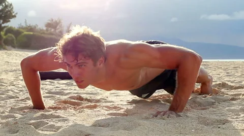 Fit Young Man Exercising on Beach. Crossfit Work Out. Healthy Active Lifestyl Stock Footage 54144607