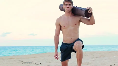 Fit Young Man Exercising on Beach. Crossfit Workout. Training Outdoors. Activ Stock Footage 54144853