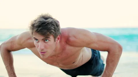 Fit Young Man Exercising on Beach. Crossfit Work Out. Healthy Active Lifestyl Stock-Footage 54144903
