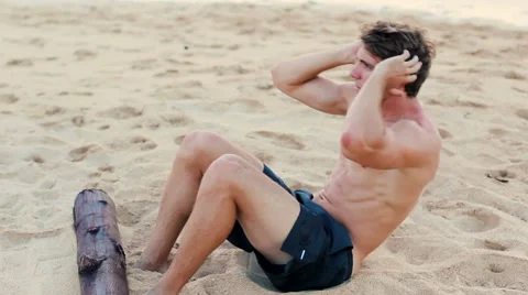 Fit Young Man Exercising on Beach. Crossfit Work Out. Healthy Active Lifestyl Видео 54144933