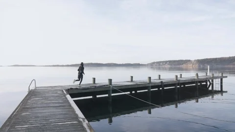 Fit Young Man Running in Slow Motion Sweden Winter Lifestyle Stock Footage 101969682