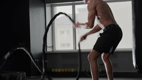 Fit young man working out by crossfit training program Stock Footage 199964664