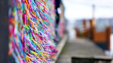 Fitas flutter in the wind outside of the Cathedral of Bonfim SHALLOW DEPTH OF Stock Footage
