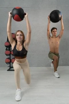 Fitball workout, exercise using balls. Group training in the fitness room Stock Photos