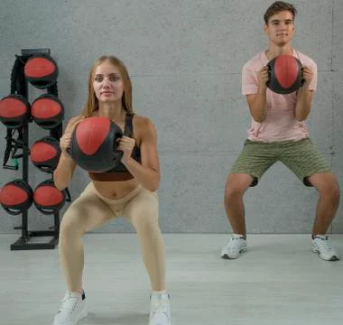Fitball workout, exercise using balls. Group training in the fitness room Stock Photos