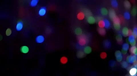 Fitness Class using glow sticks in a dark setting - Light Bokeh Video stock 67667034