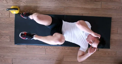 Fitness coach doing abs workout on the yoga mat Video stock 67220044
