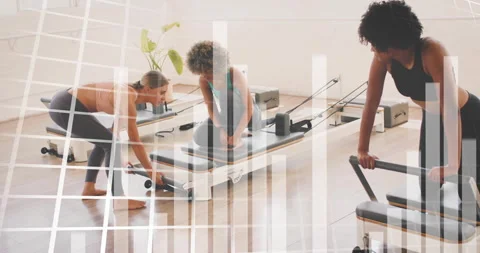 Fitness data visualization animation over women exercising on Pilates reformers Stock Footage 304666705