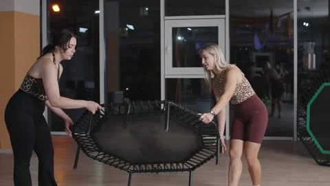 Fitness enthusiasts demonstrate effective stretching techniques Video stock 321751965