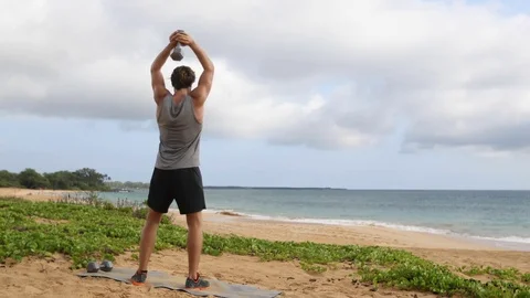 Fitness exercises with dumbbells - Man doing Standing Dumbbell Triceps Extension 스톡 동영상 79849941