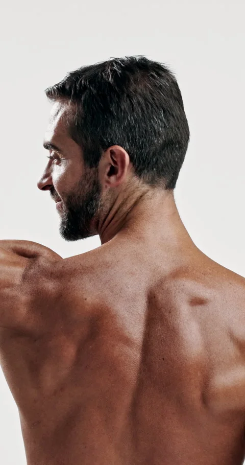 Fitness, flex and back of man in studio for sports athlete, shirtless and muscle Stock Footage 306464462