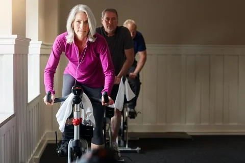 Fitness is great for ageing and for the mind. a group of seniors having a Stock Photos
