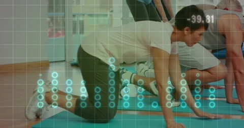 Fitness group after coach lean, shifting onto blue mats, kneeling, holding plank Stock Footage 323455681