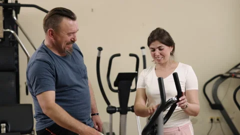 Fitness guidance, Supervised workout, Machine training Stock Footage 302025239