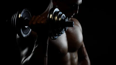 Fitness guy showing muscles Stock Footage 117911084