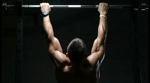 Fitness man doing pull-ups exercises in gym Stock-Footage 144563658