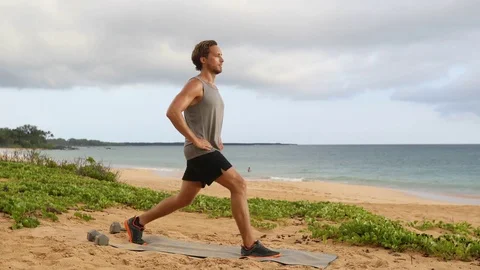 Fitness man doing Pulse Lunges exercise Stock Footage 79863198