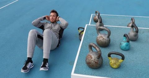 Fitness man doing situps training abs exercise crunches for weight loss and ab Stock Footage 220147577